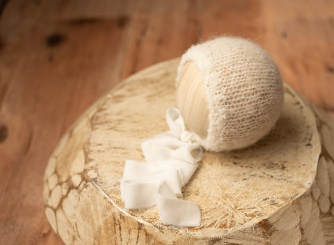 Cream/off-white Iona Newborn Bonnet with velvet ties